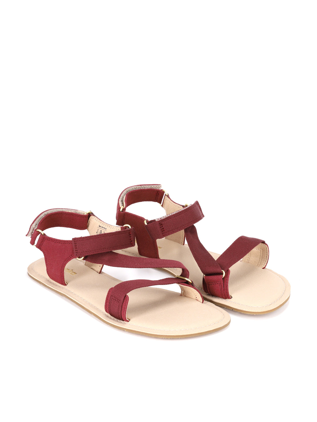 Par de sandalias barefoot Be Lenka Flexi 2.0 burdeos con tiras de tela y suela clara.